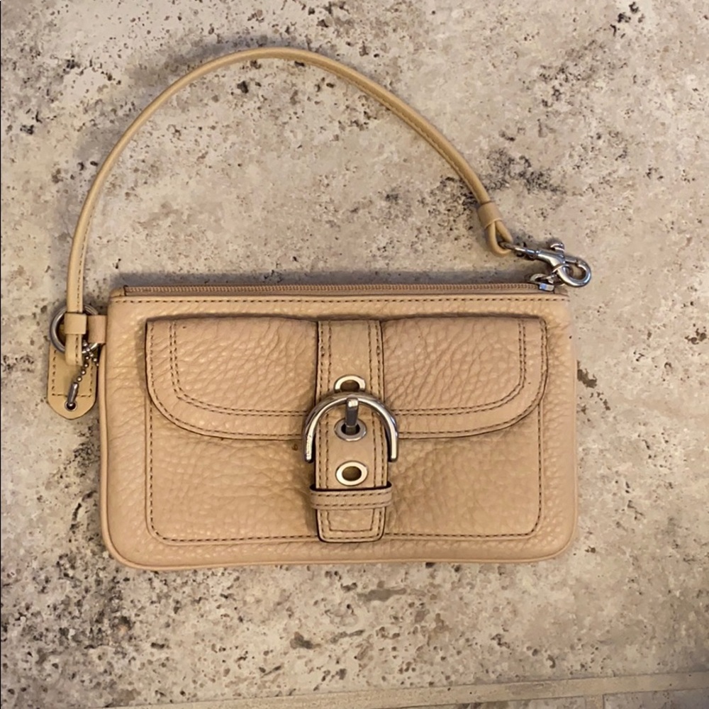 Like new badge leather coach wristlet